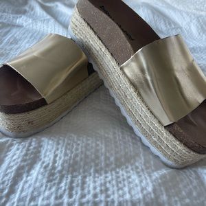 Never worn platform gold metallic sandals